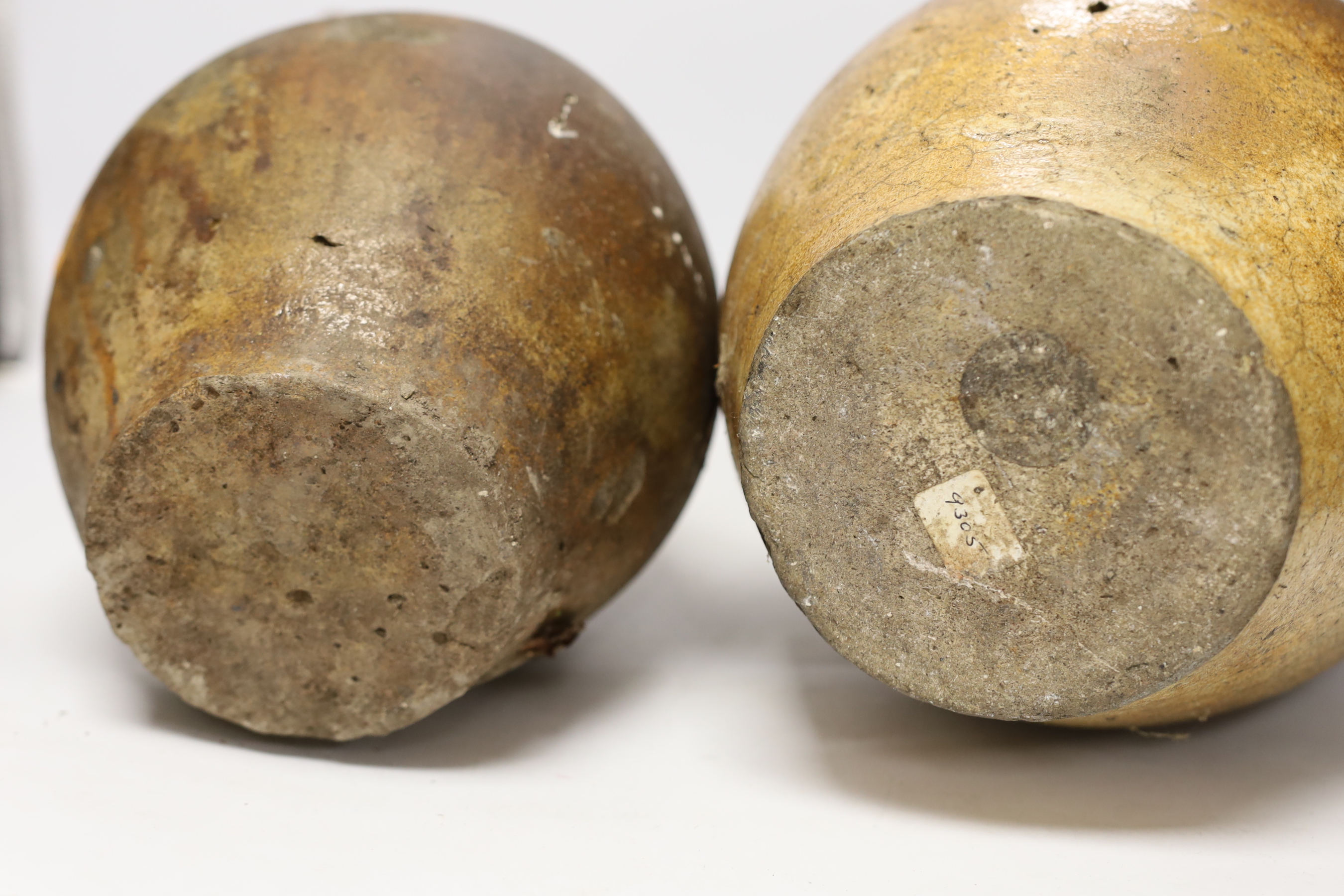 An 18th century German stoneware bellamine and another, 38cm